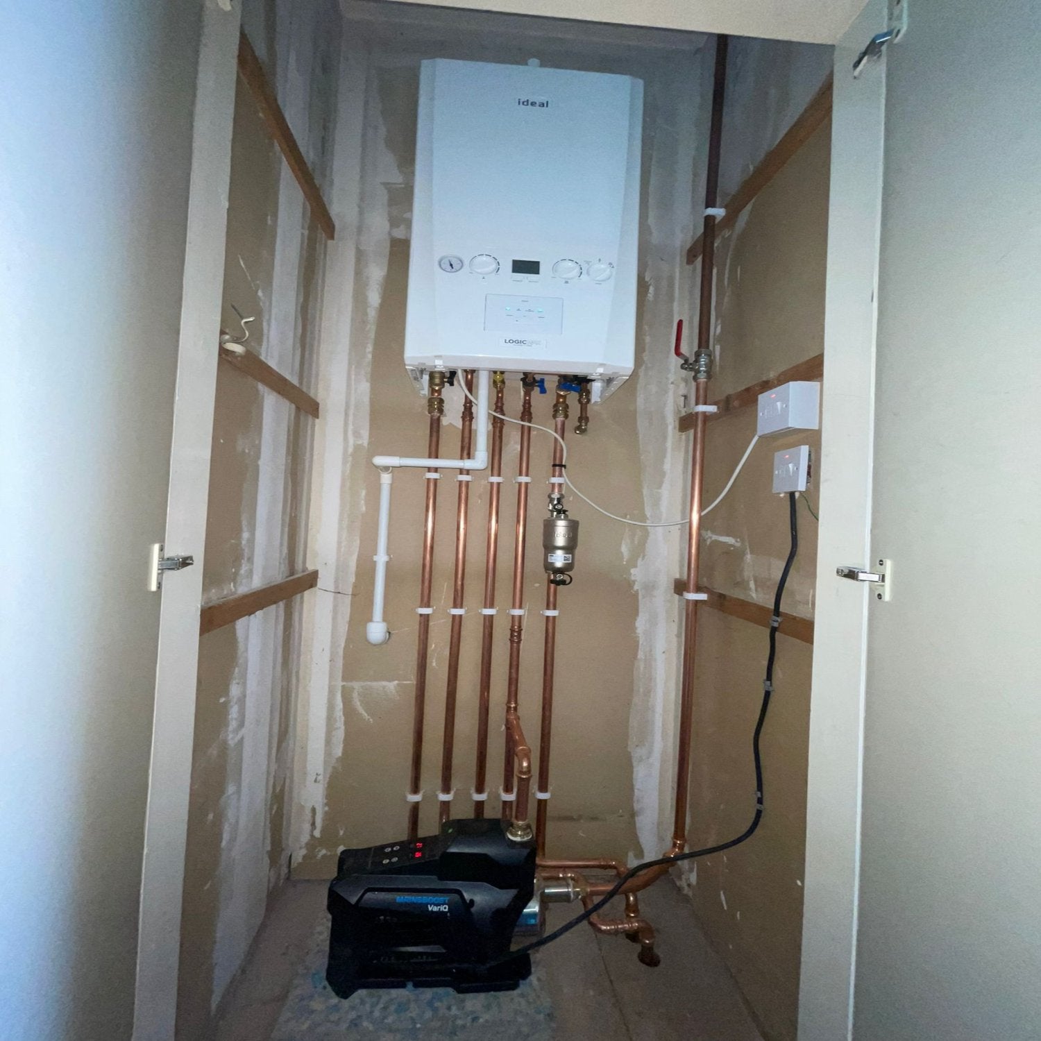 EnergyUpgrade.ie team installing a combi boiler in Portmarnock.